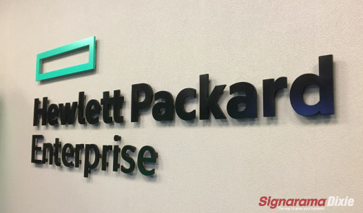 A lobby sign shows business logo and name is made by signarama dixie 