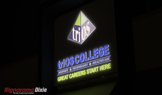 channel letters as storefront illuminated at night